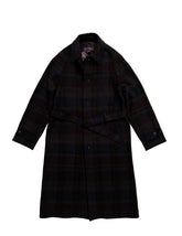 Black checkered coat on a beige background